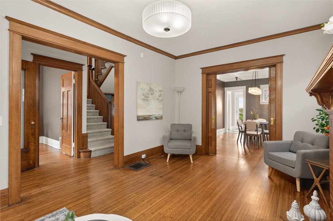 34 Erion Crescent Rochester, NY 14607 - Photo 13 of 49 living room with view to dining room and parlor/de