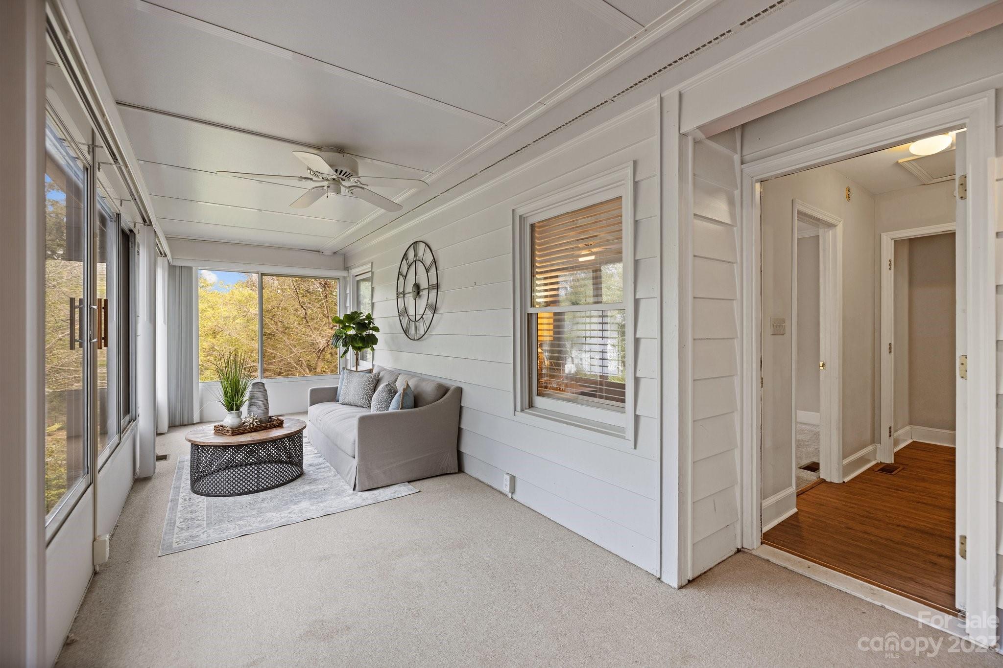 312 Brandywine Road Charlotte, NC 28209 - Photo 20 of 31 a living room with furniture and windows