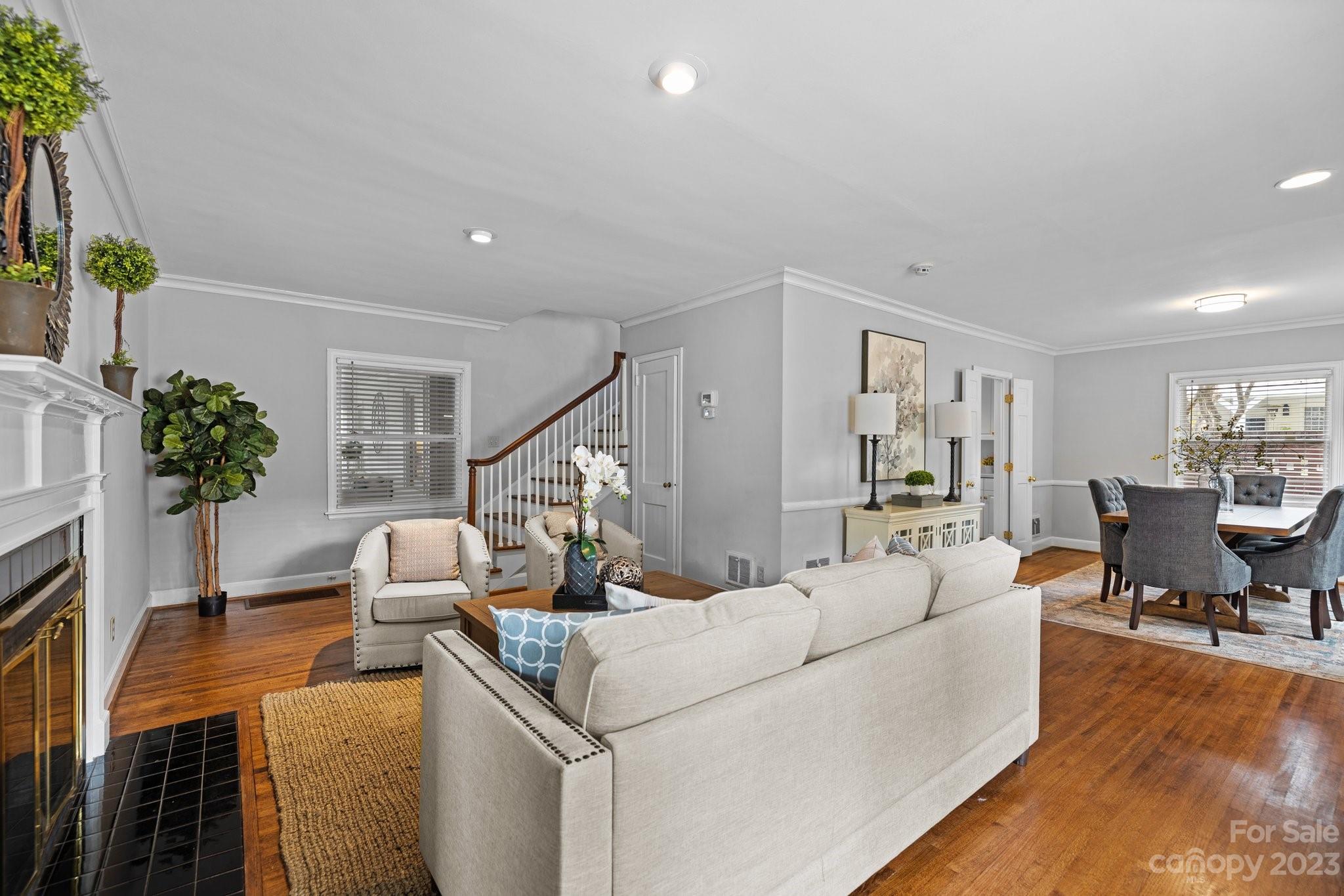 312 Brandywine Road Charlotte, NC 28209 - Photo 6 of 31 a living room with furniture and a wooden floor