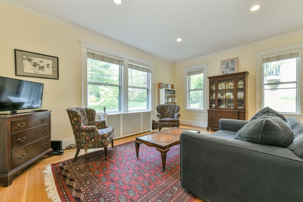 78 Windsor Road, Unit 1 Brookline, MA 02445 - Photo 7 of 11 a living room with furniture and a window