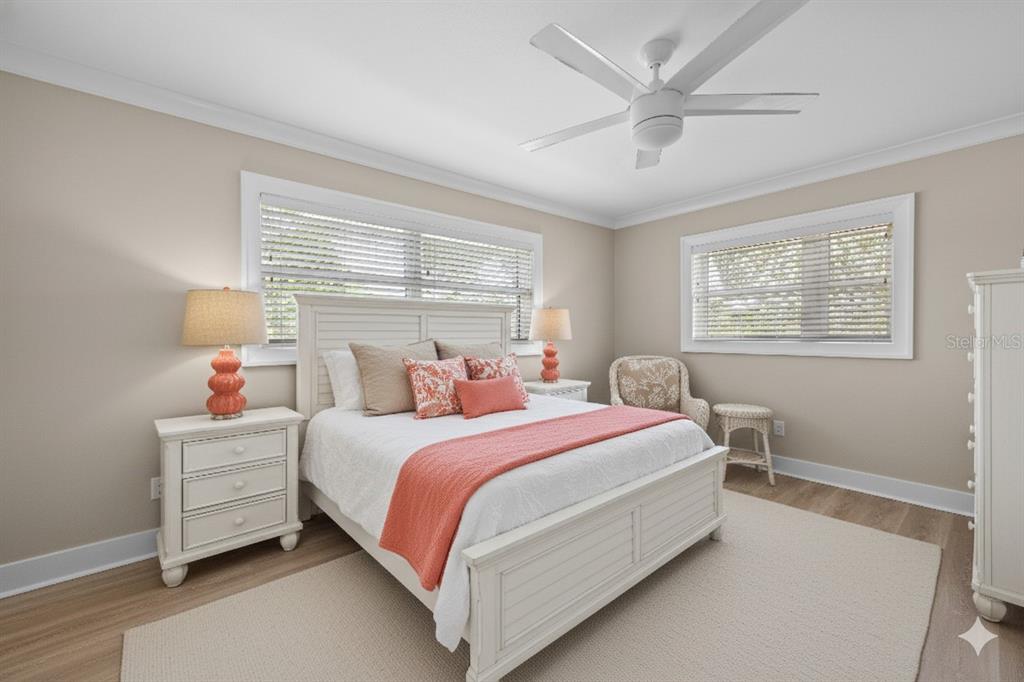 8552 Lagoon Road Fort Myers Beach, FL 33931 - Photo 14 of 33 a bed room with a bed and a window