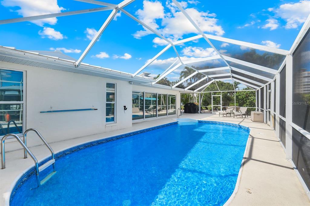 8552 Lagoon Road Fort Myers Beach, FL 33931 - Photo 21 of 33 a view of a room with wooden floor