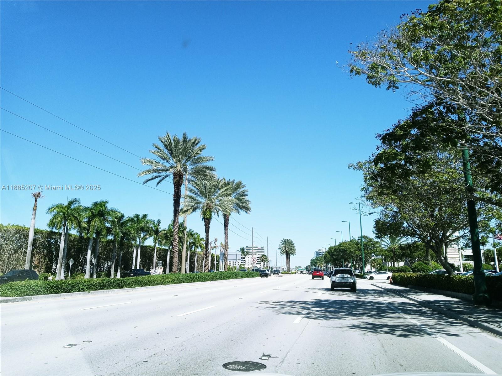 20400 West Country Club Drive, Unit 303 Aventura, FL 33180 - Photo 3 of 3 a view of a road with a house in the background