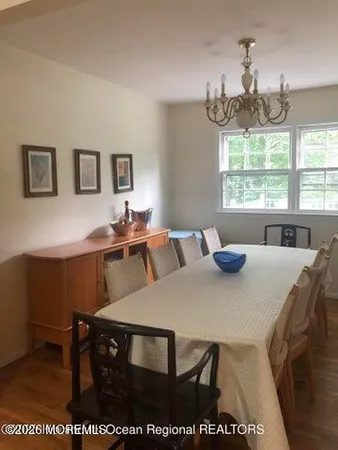 a view of a dining room with furniture