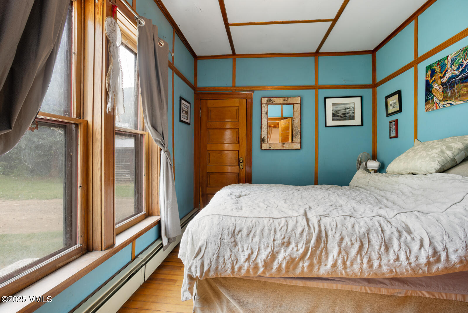 407 Water Street Red Cliff, CO 81649 - Photo 20 of 25 a bedroom with a bed and a window