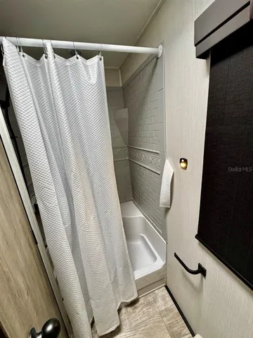 a bathroom with a sink and toilet