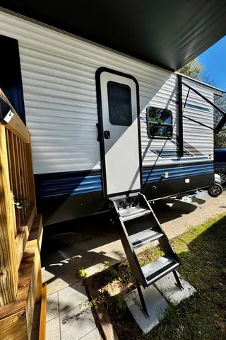 a view of backyard with chairs