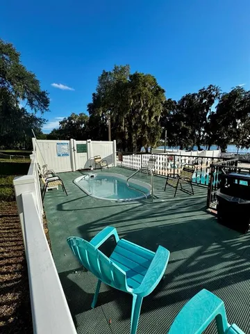 a view of balcony with wooden floor