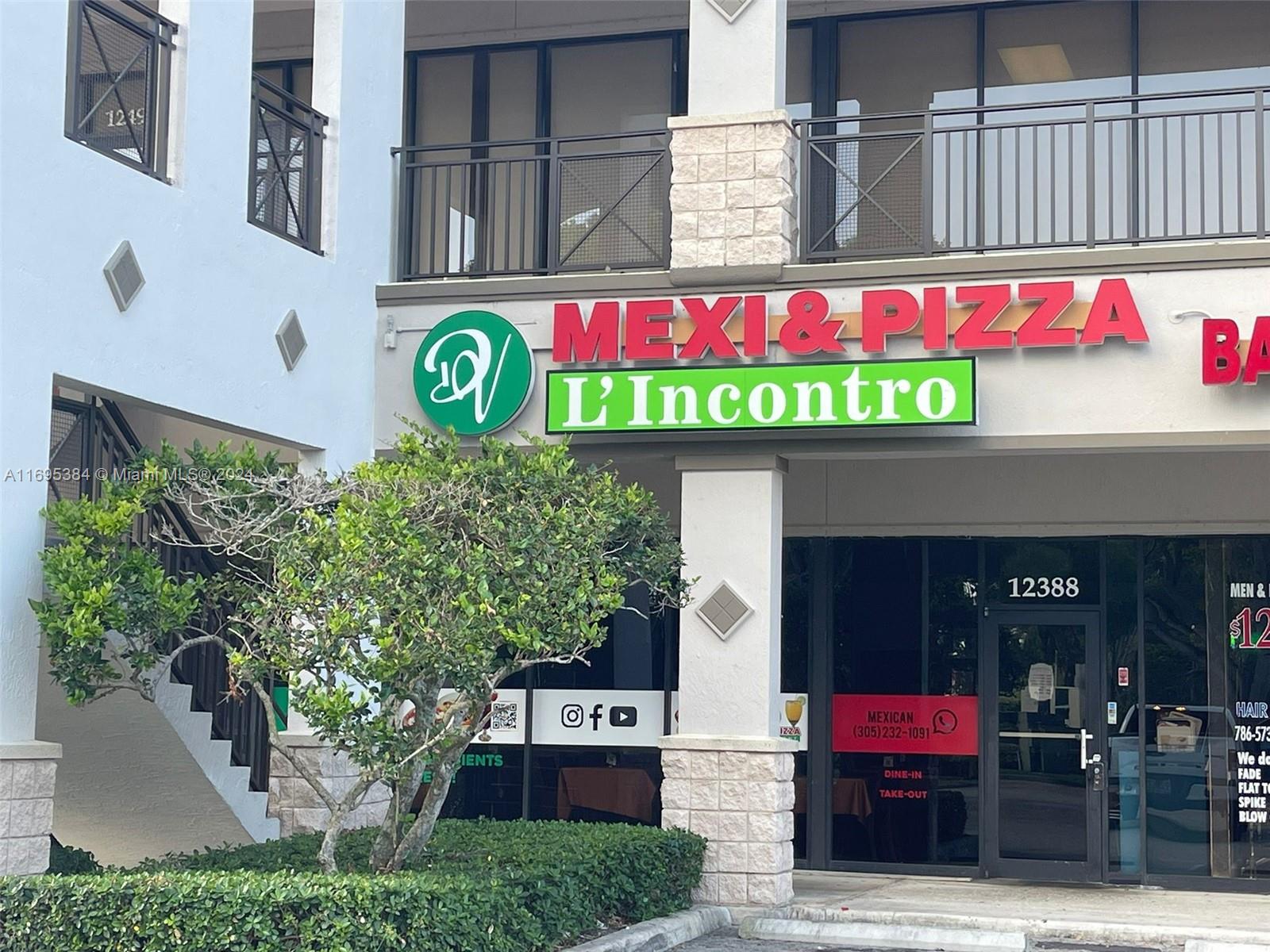 12388 Southwest 127th Avenue Miami, FL 33186 - Photo 1 of 28 a sign that is on the side of building