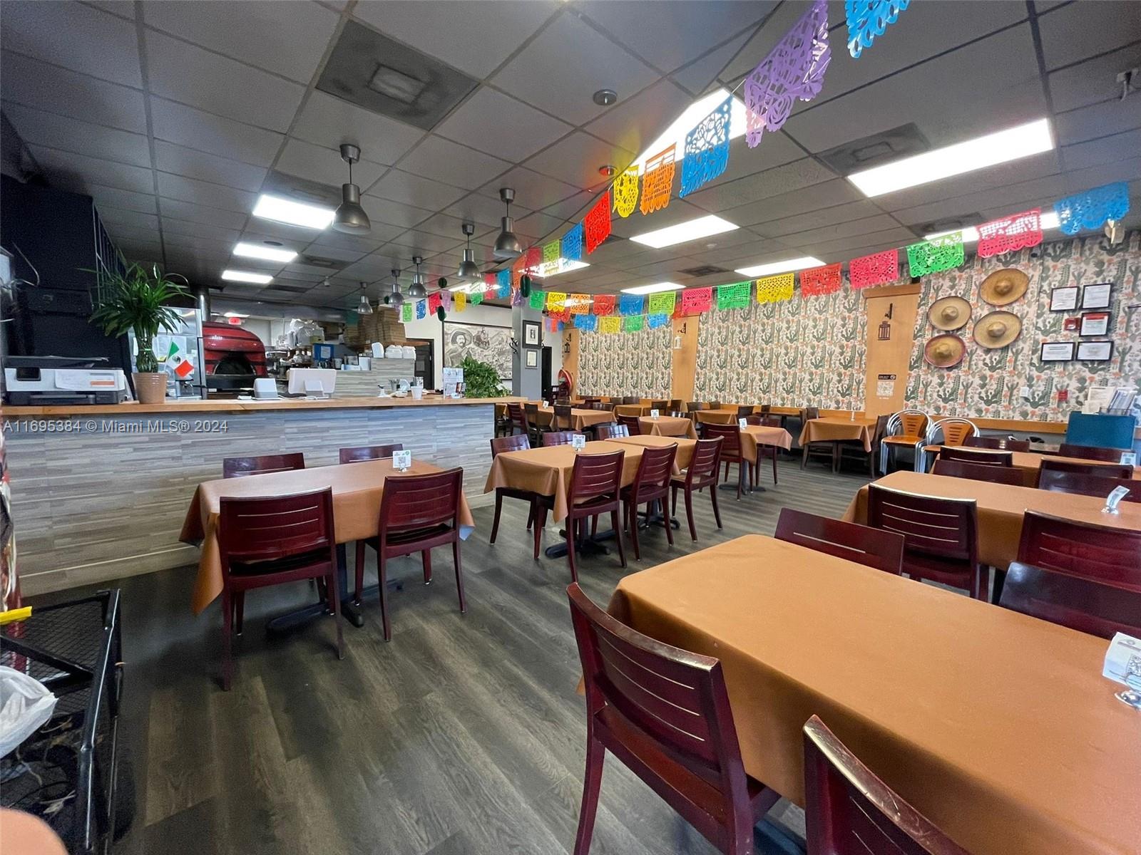 12388 Southwest 127th Avenue Miami, FL 33186 - Photo 24 of 28 a view of a bar restaurant