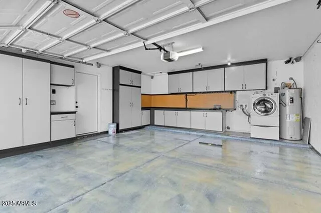 a view of a garage with table and sofas