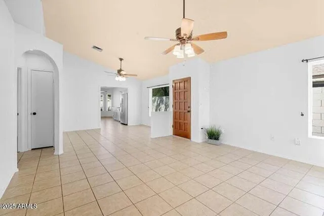 a view of an empty room and window