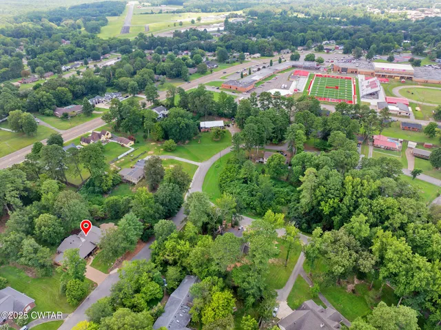 a view of a city and swimming pool