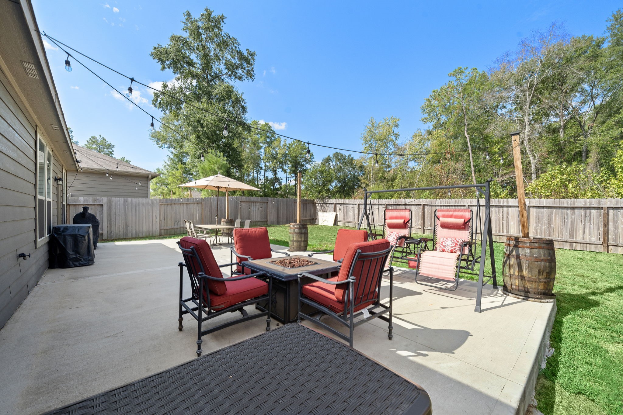 4210 Amber Ruse Drive Conroe, TX 77304 - Photo 42 of 45 Outdoor Patio with no back neighbors.