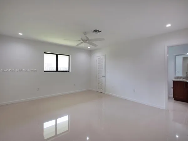 an empty room with windows
