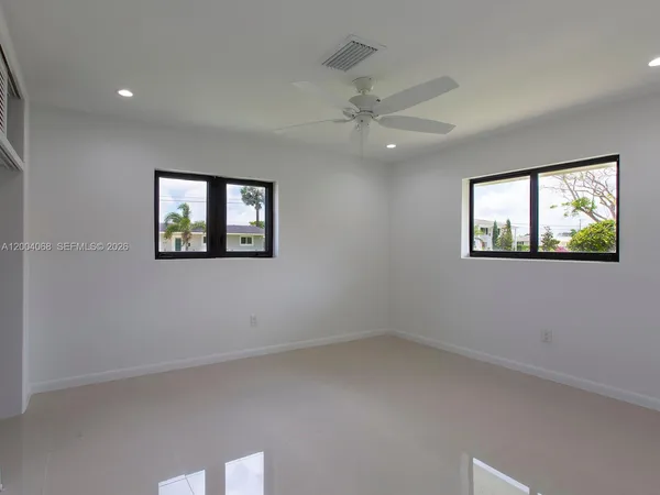 an empty room with windows
