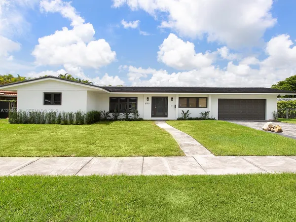 a view of house that has garden