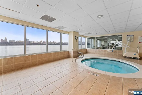 a view of a swimming pool and outdoor space