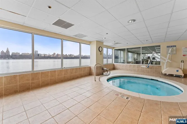 a view of a swimming pool and outdoor space