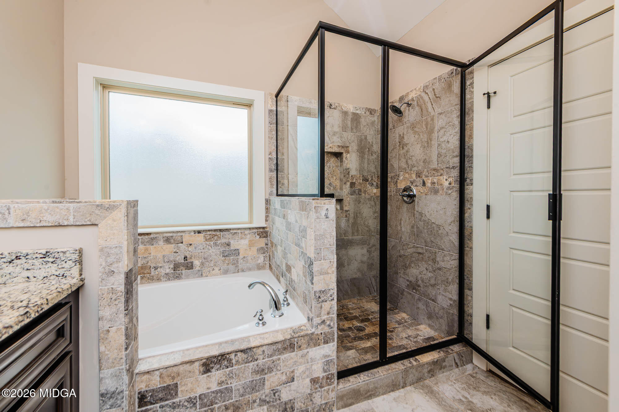 112 Agriculture Lane Perry, GA 31069 - Photo 21 of 40 a bathroom with a bathtub and a shower
