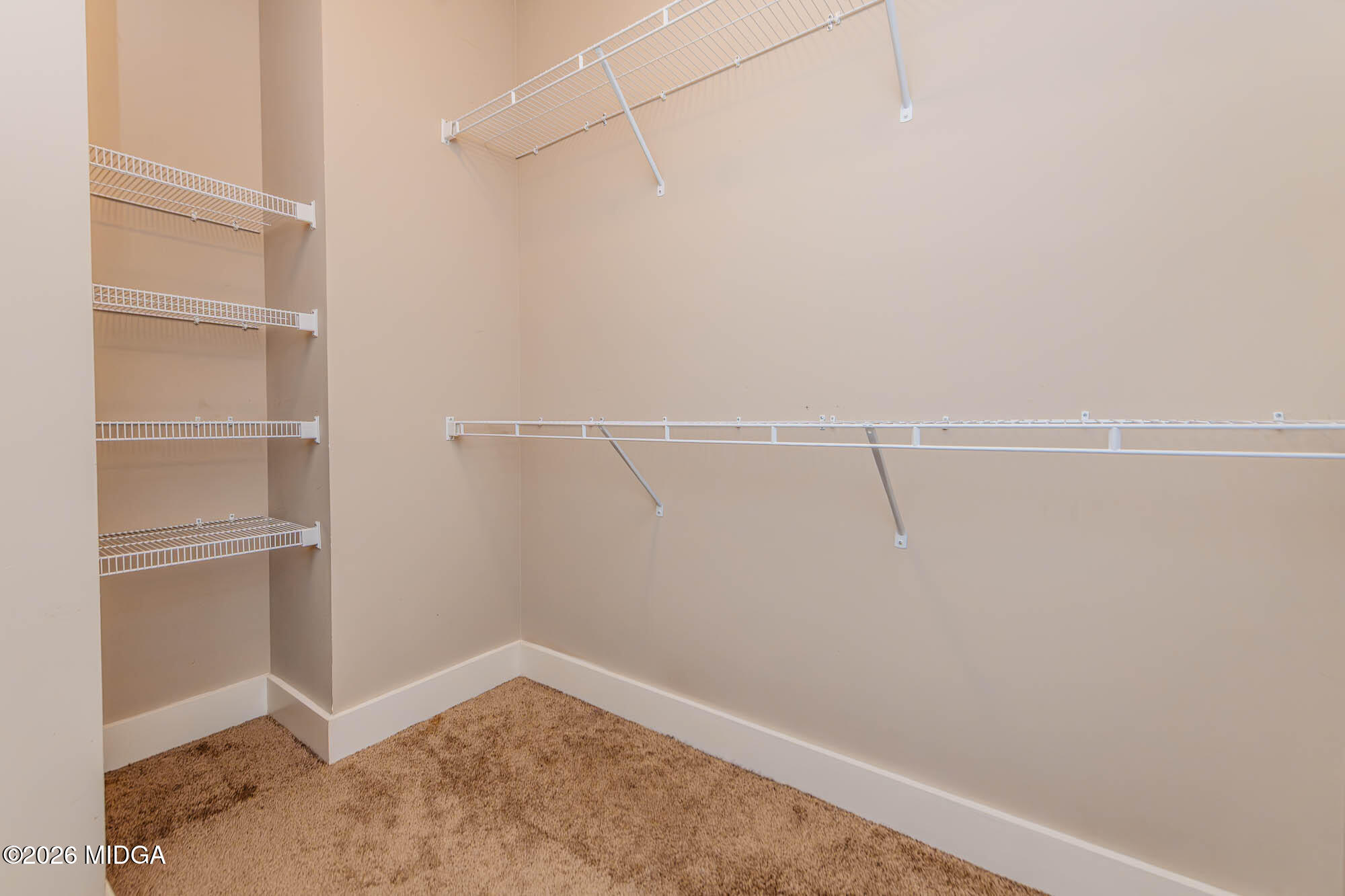 112 Agriculture Lane Perry, GA 31069 - Photo 23 of 40 a view of a room with empty racks
