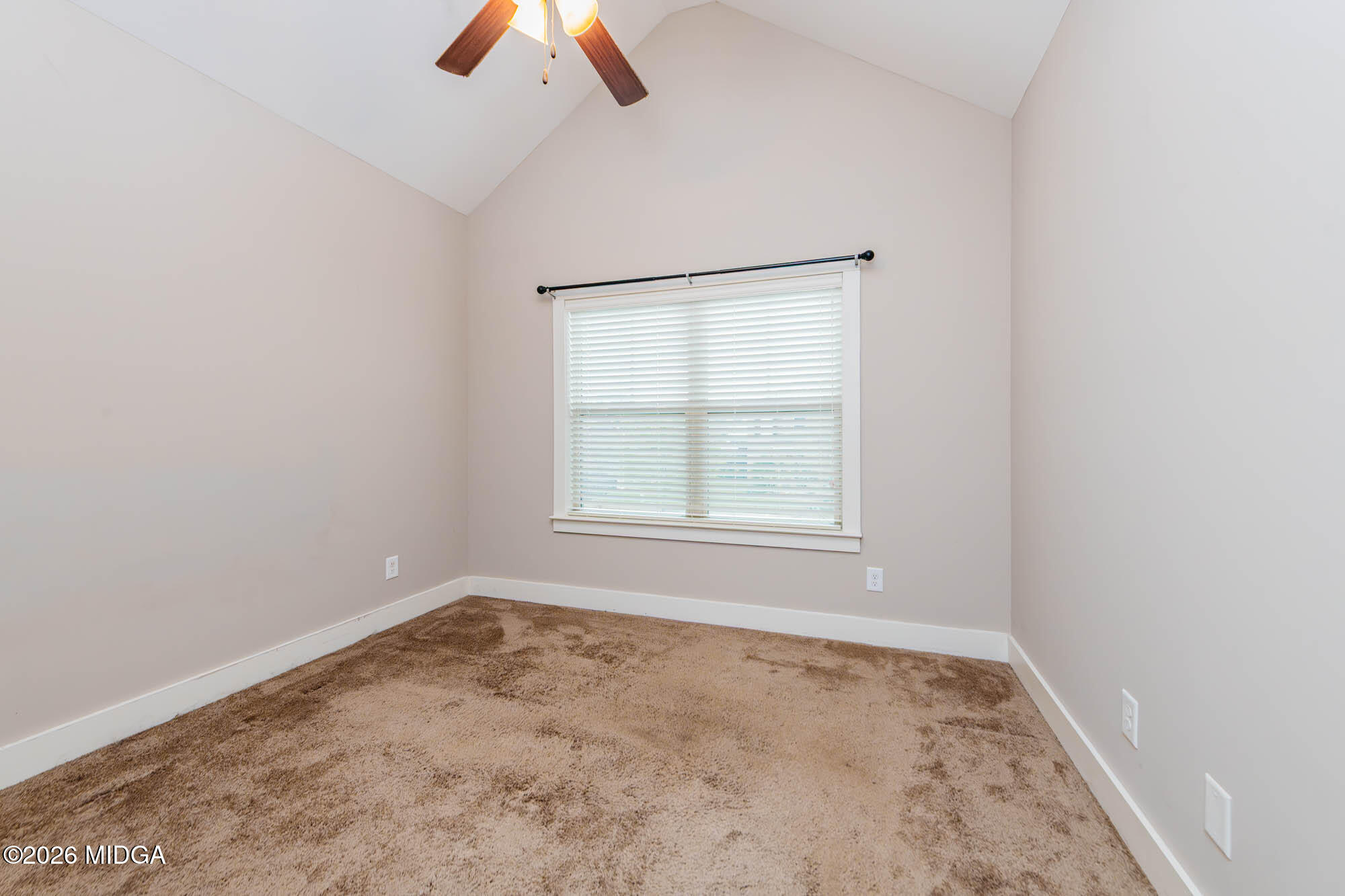 112 Agriculture Lane Perry, GA 31069 - Photo 32 of 40 an empty room with windows and fan