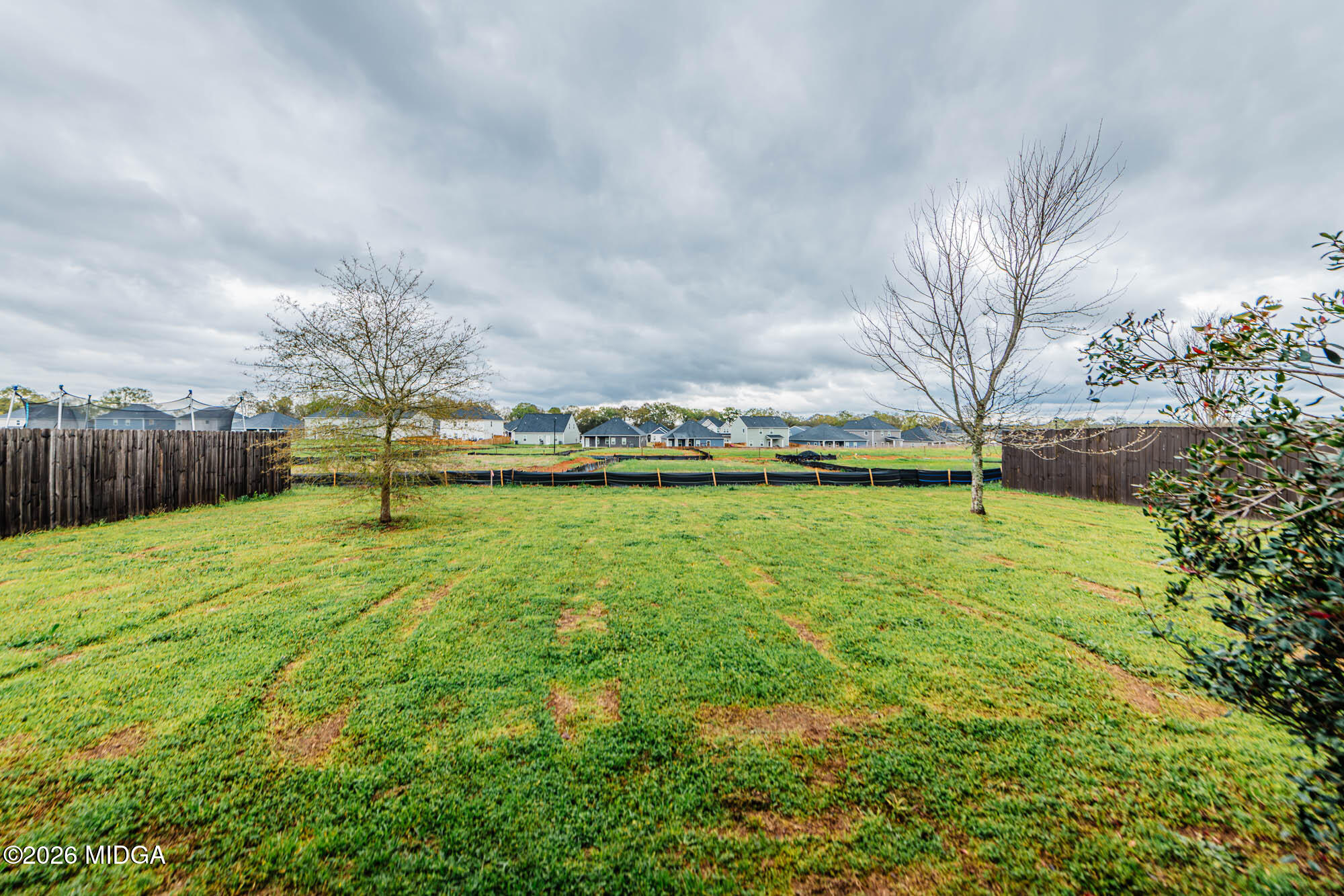 112 Agriculture Lane Perry, GA 31069 - Photo 37 of 40 a view of yard with swimming pool and green space