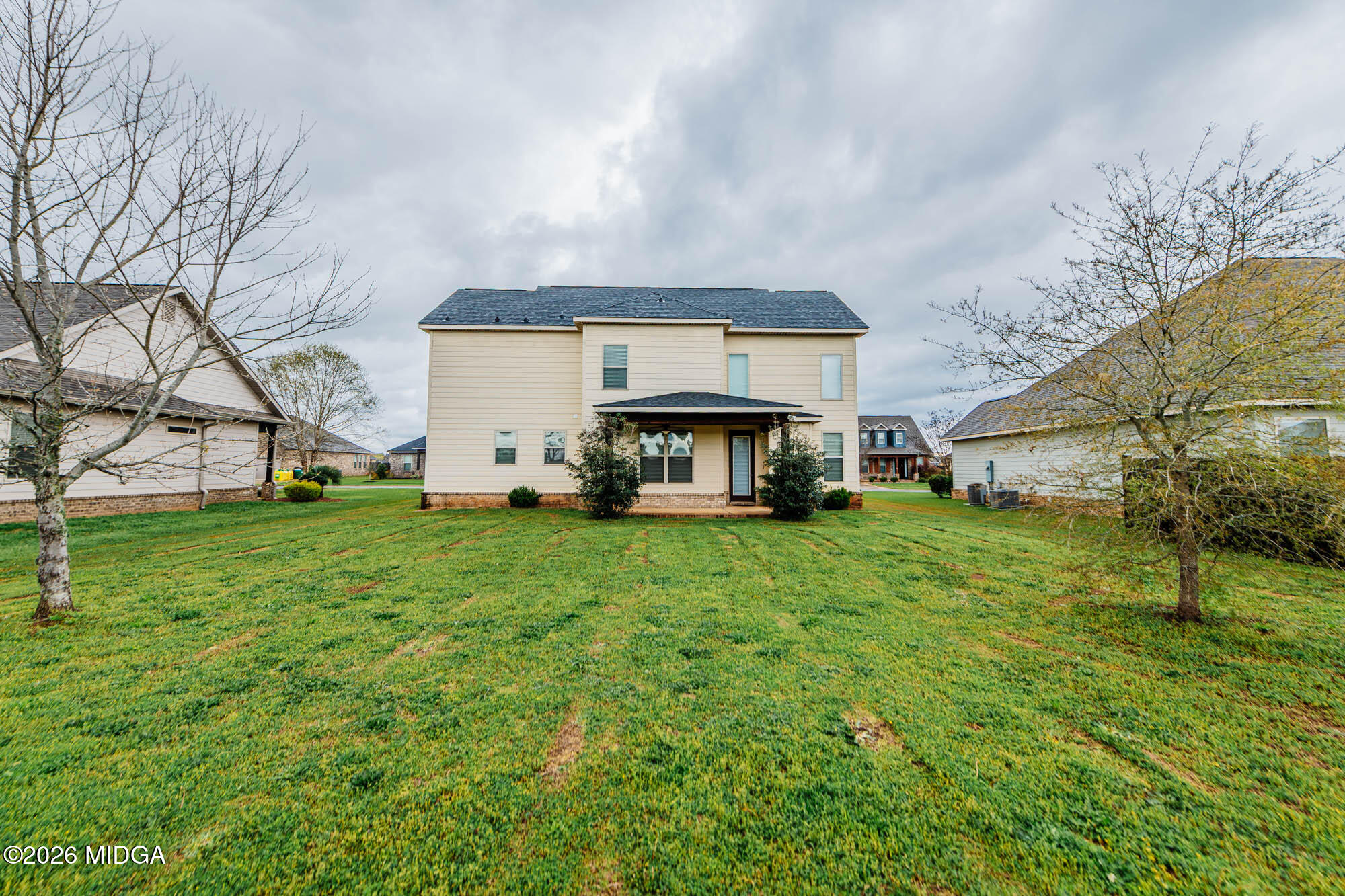112 Agriculture Lane Perry, GA 31069 - Photo 39 of 40 a view of a house with backyard