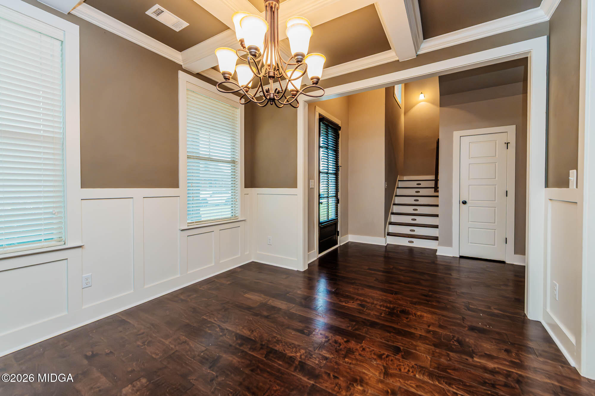 112 Agriculture Lane Perry, GA 31069 - Photo 9 of 40 wooden floor in an empty room with a window