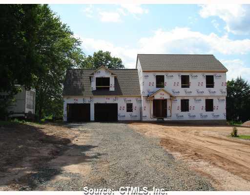 4 Farm Hill Road Middletown, CT 06457 - Photo 1 of 1 a front view of a house with a yard