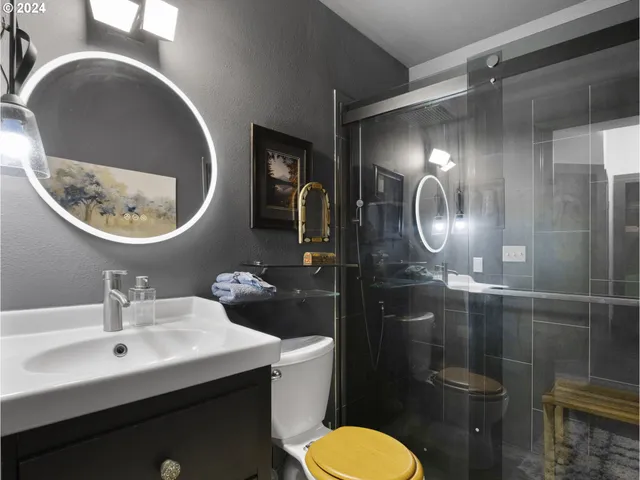 a view of a patio with a table and chairs