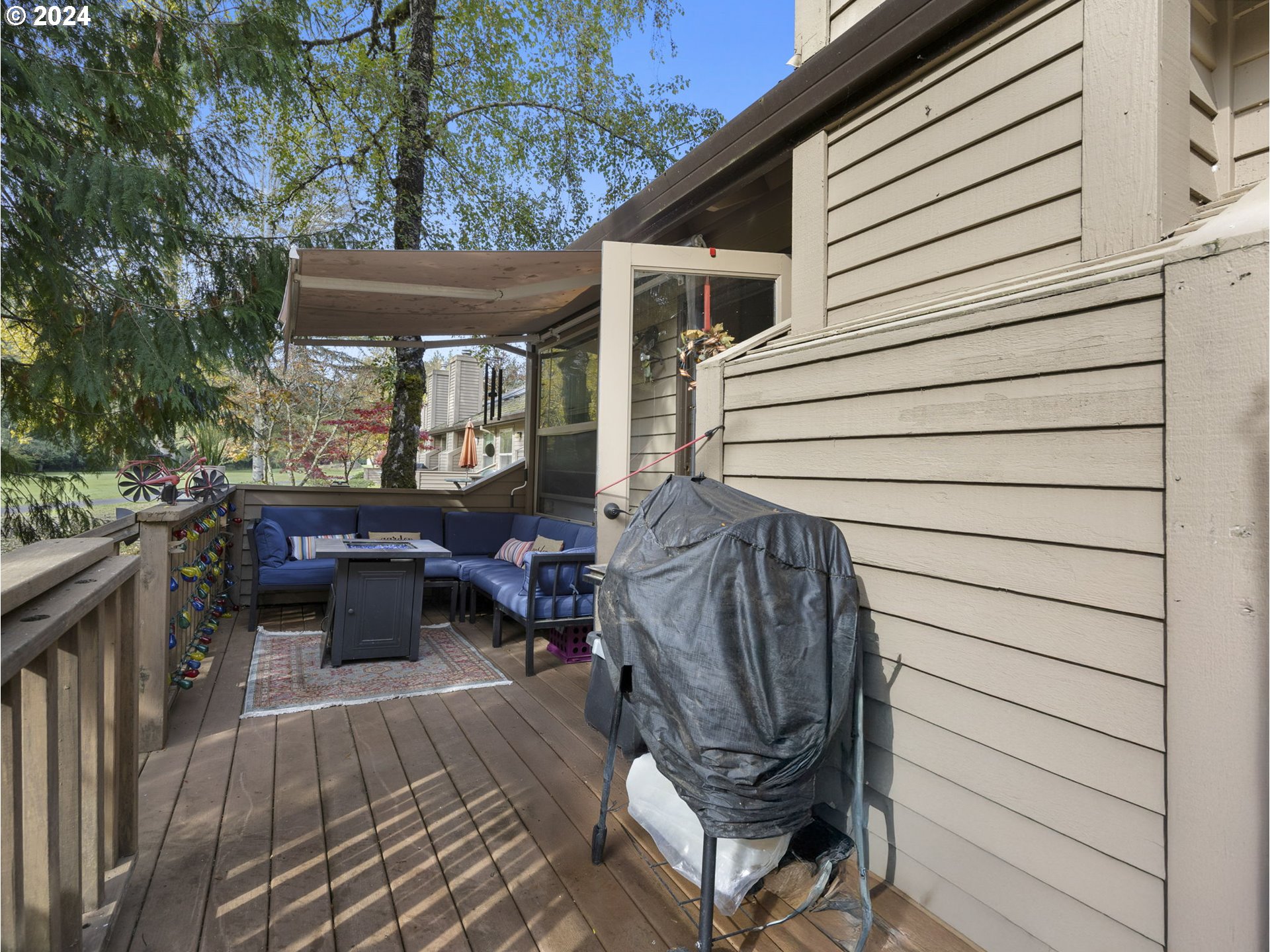 68116 Woodruff Way, Unit 462 Welches, OR 97067 - Photo 22 of 33 a view of a patio with a table and chairs