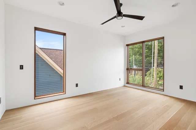 a view of kitchen with granite countertop cabinets and outdoor space