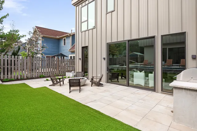 a bathroom with a shower and a sink