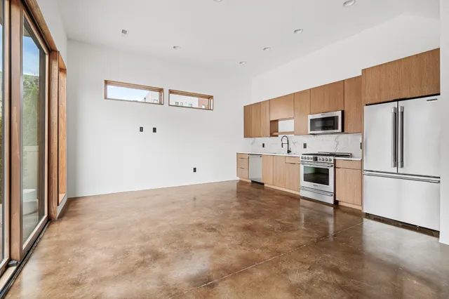 a view of balcony with wooden floor