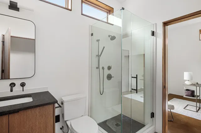 a work room with furniture and a window