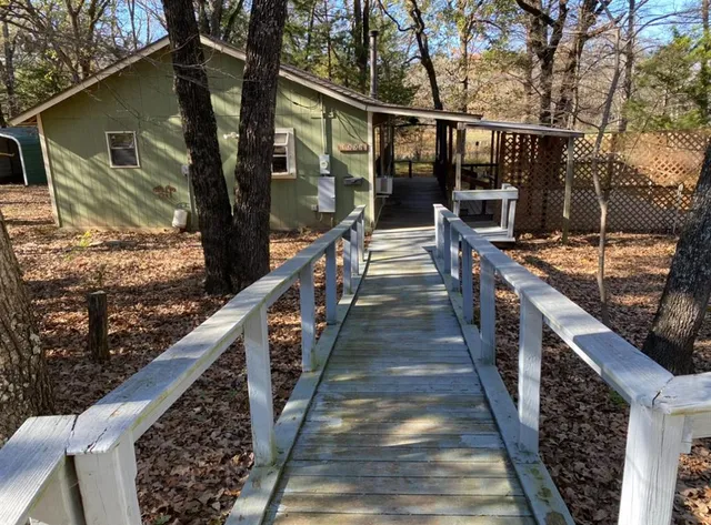 a backyard of a house with lots of green space