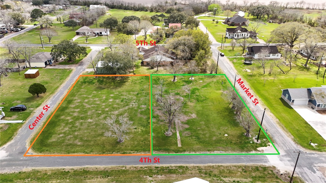 0 4th Street Louise, TX 77455 - Photo 2 of 12 an aerial view of residential houses with outdoor space