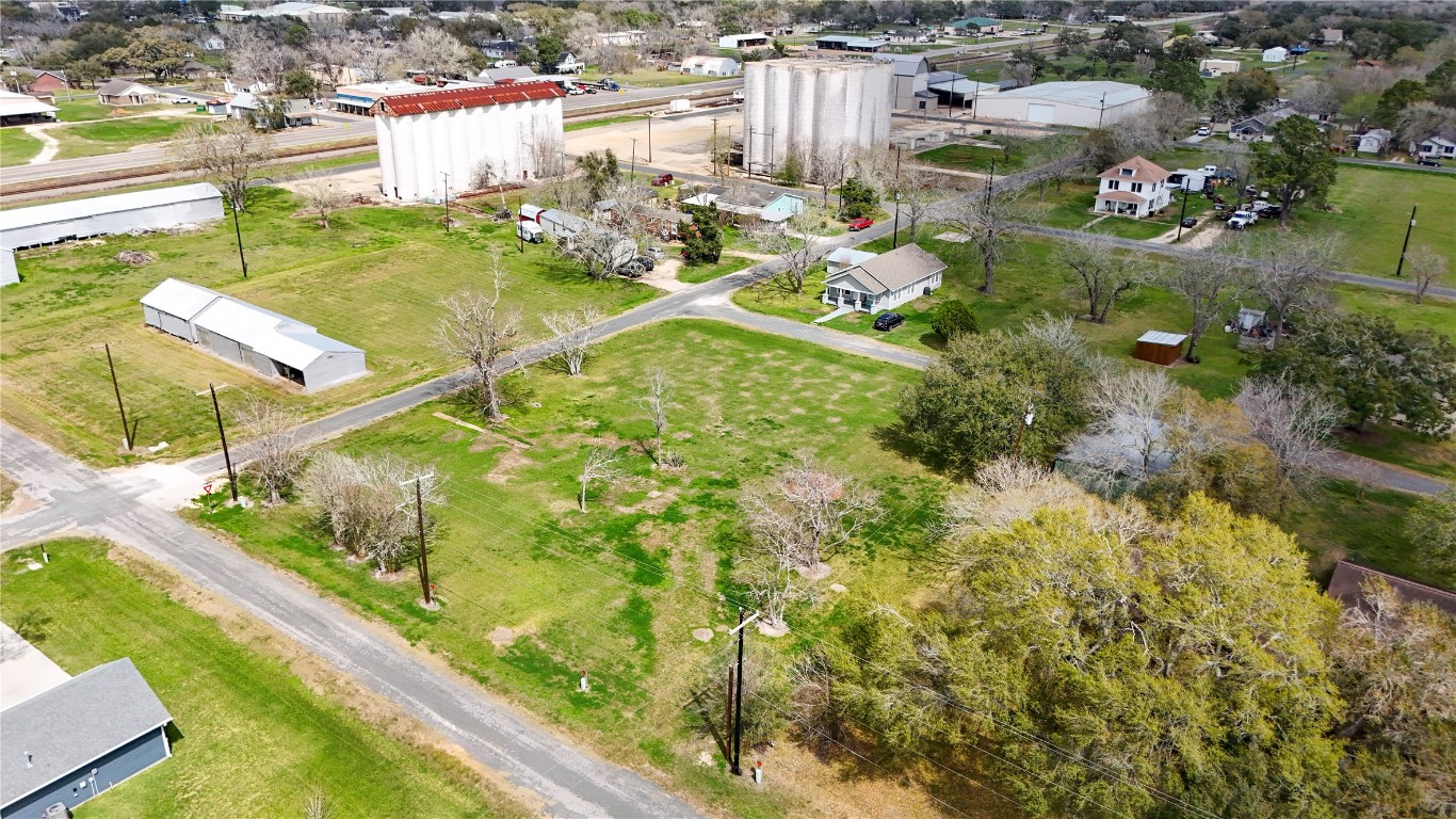 0 4th Street Louise, TX 77455 - Photo 7 of 12 an aerial view of residential houses with outdoor space