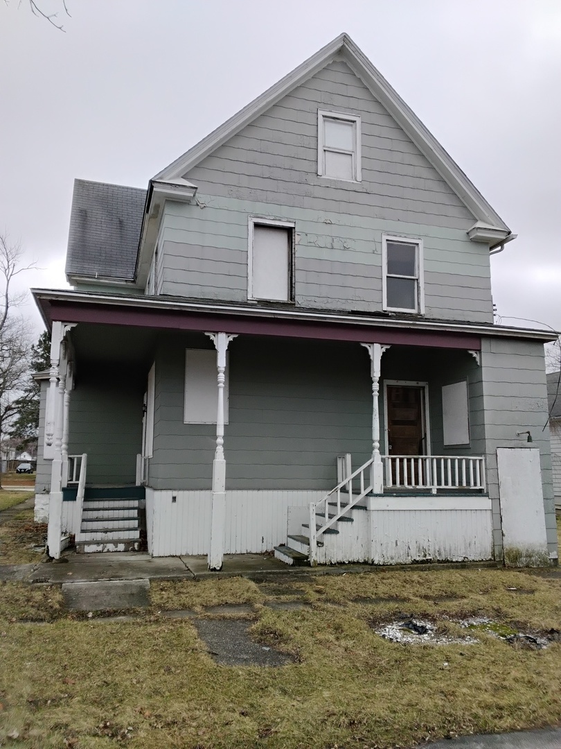 3704 214th Place Matteson, IL 60443 - Photo 1 of 29 front view of a house with a fence