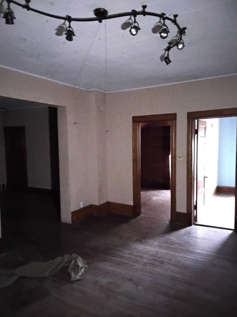 3704 214th Place Matteson, IL 60443 - Photo 15 of 29 wooden floor in an empty room with a window