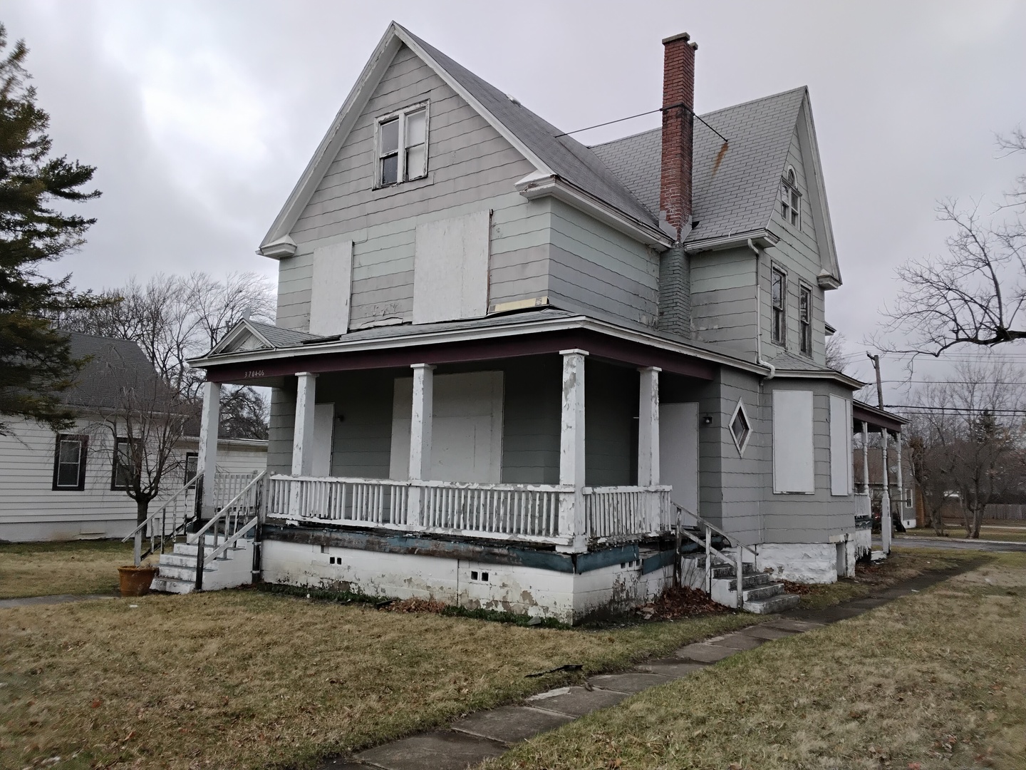 3704 214th Place Matteson, IL 60443 - Photo 2 of 29 a front view of a house with a yard