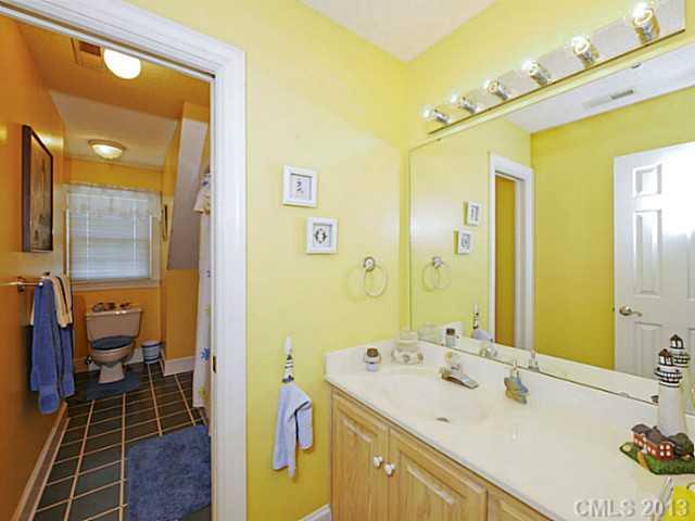 611 East Sandy Ridge Road Monroe, NC 28112 - Photo 12 of 16 a bathroom with a sink and a mirror
