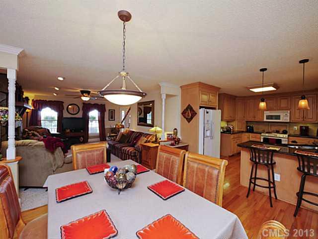 611 East Sandy Ridge Road Monroe, NC 28112 - Photo 6 of 16 a living room with furniture and kitchen view