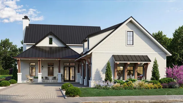 a front view of a house with garden