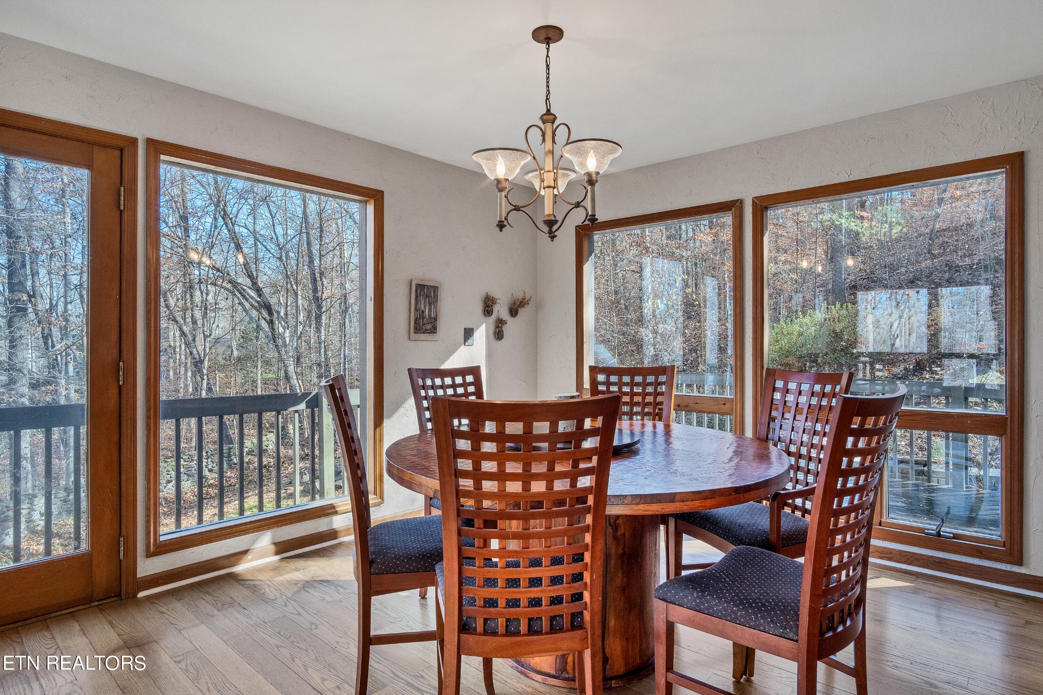105 Clayton Way Oak Ridge, TN 37830 - Photo 13 of 42 a view of a dining room with furniture window and wooden floor
