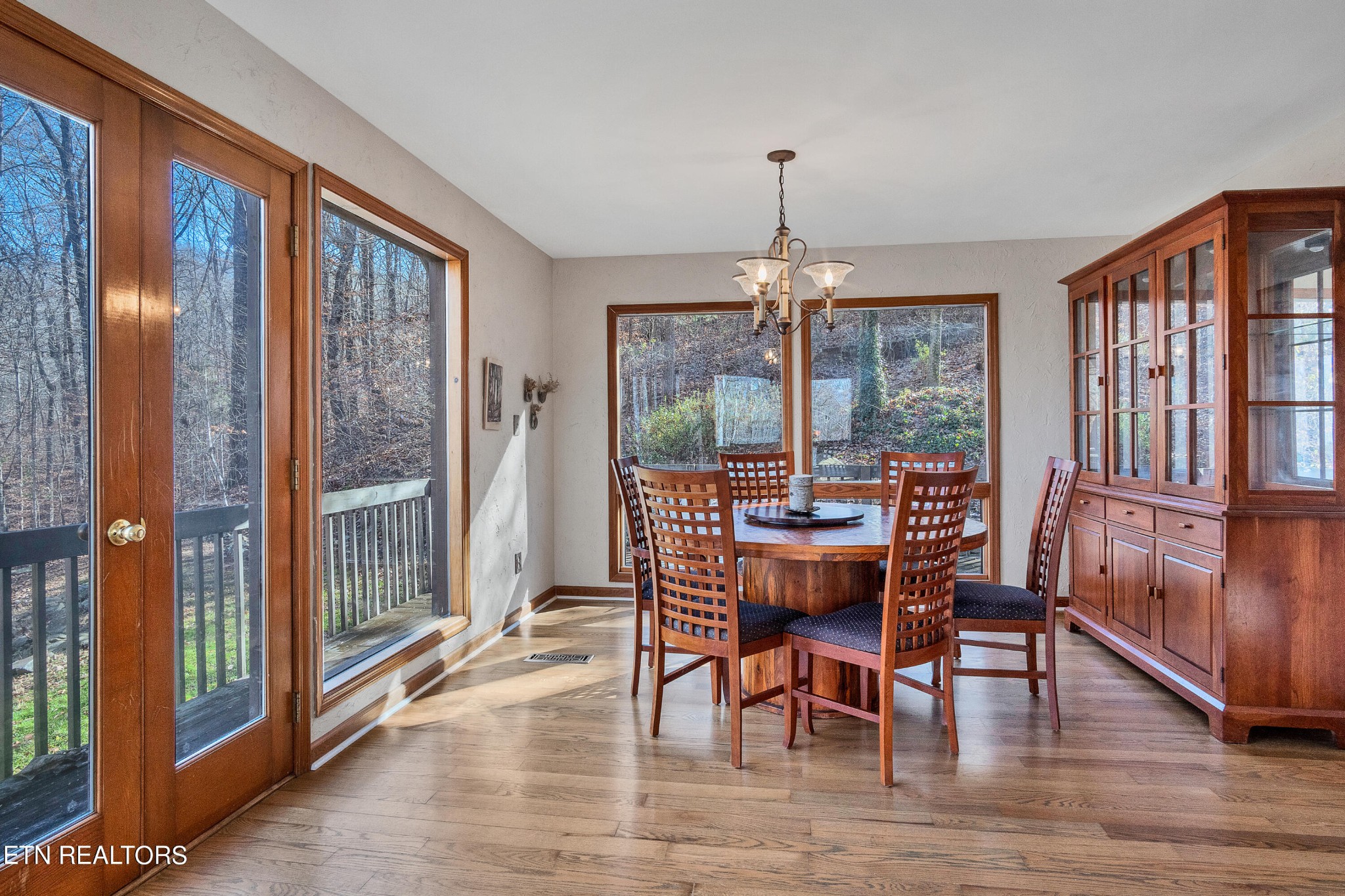 105 Clayton Way Oak Ridge, TN 37830 - Photo 14 of 42 a view of a dining room with furniture window and wooden floor