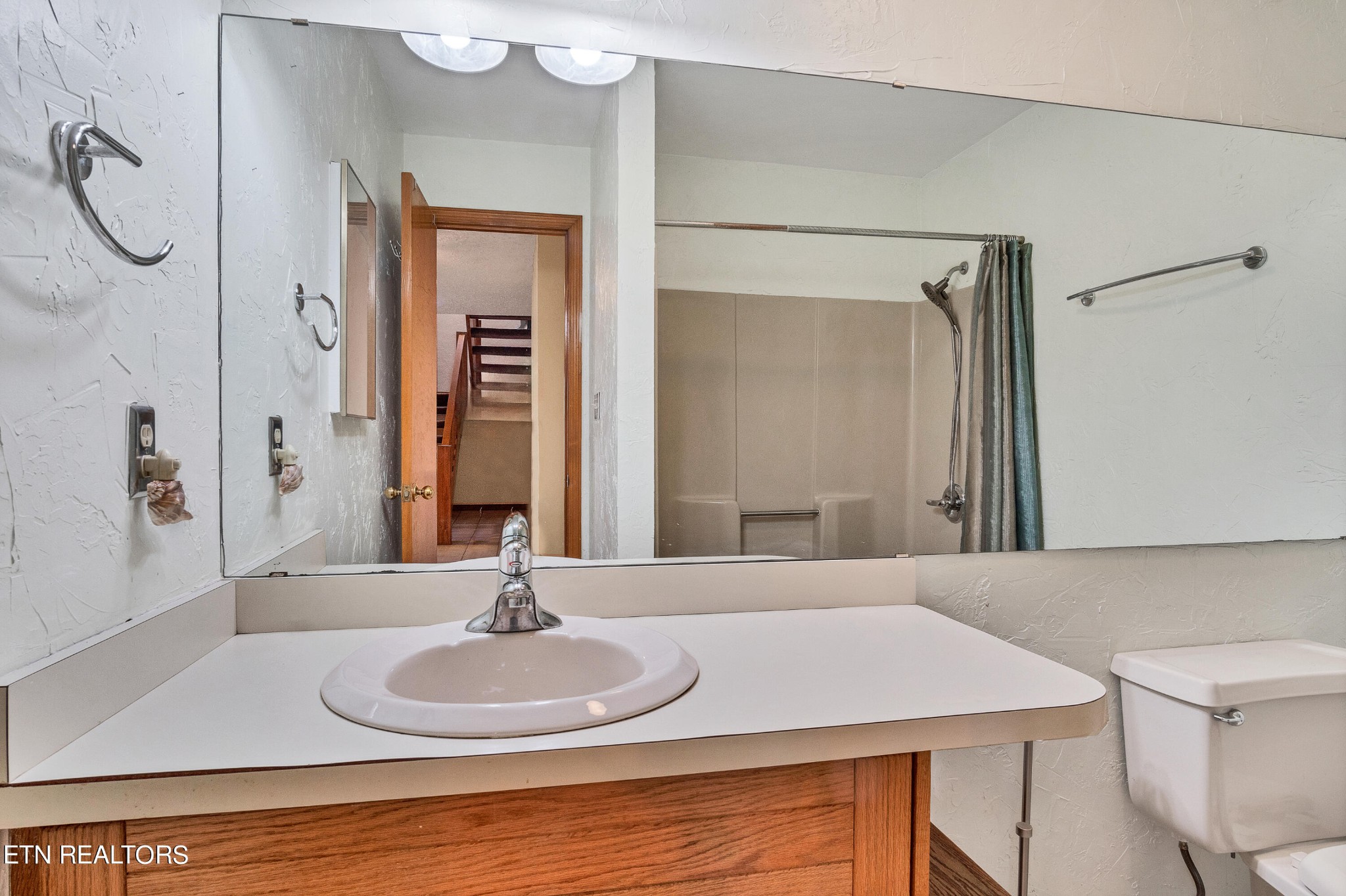 105 Clayton Way Oak Ridge, TN 37830 - Photo 36 of 42 a bathroom with a sink and a mirror