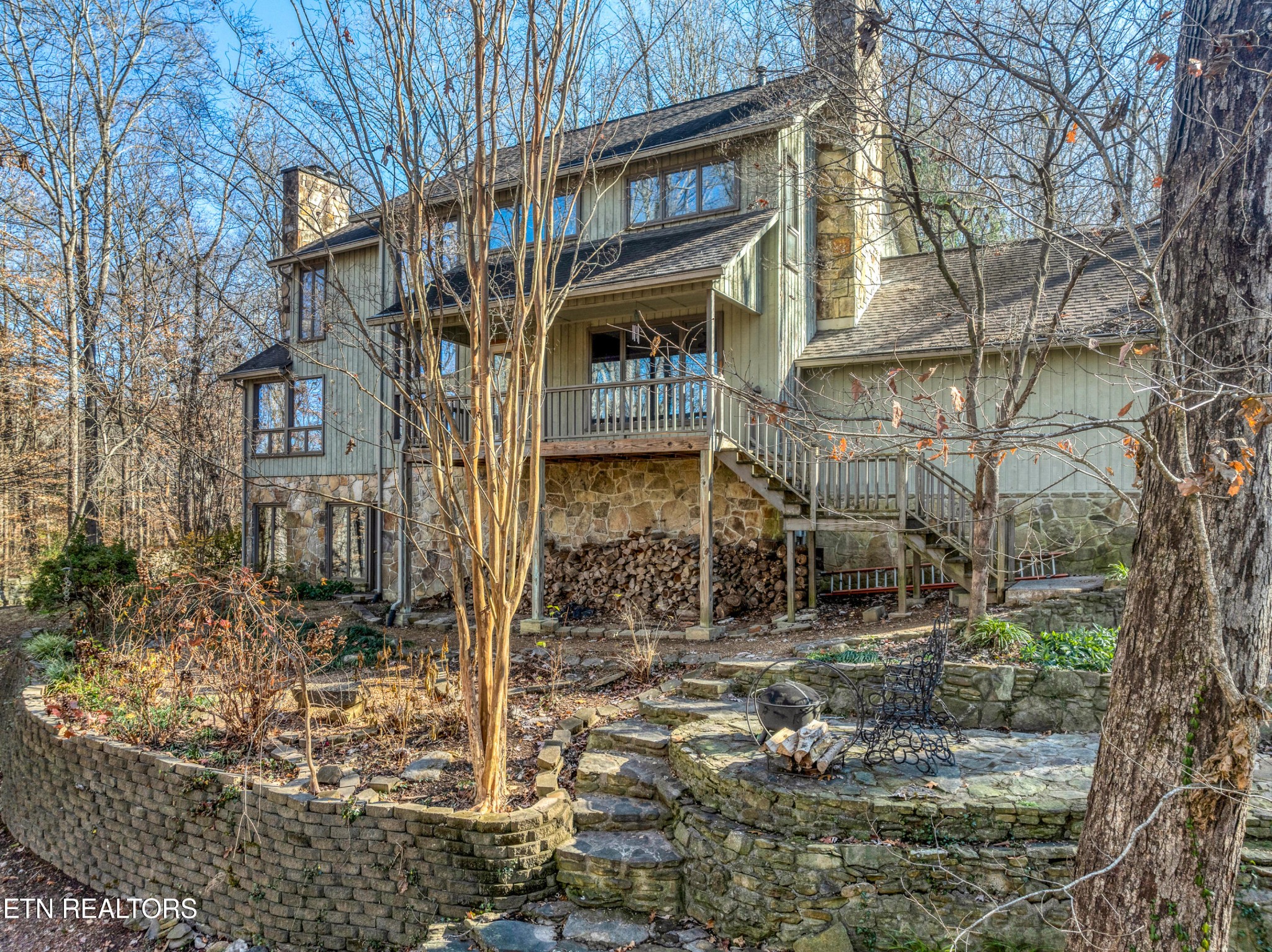 105 Clayton Way Oak Ridge, TN 37830 - Photo 39 of 42 a view of a brick house with large windows