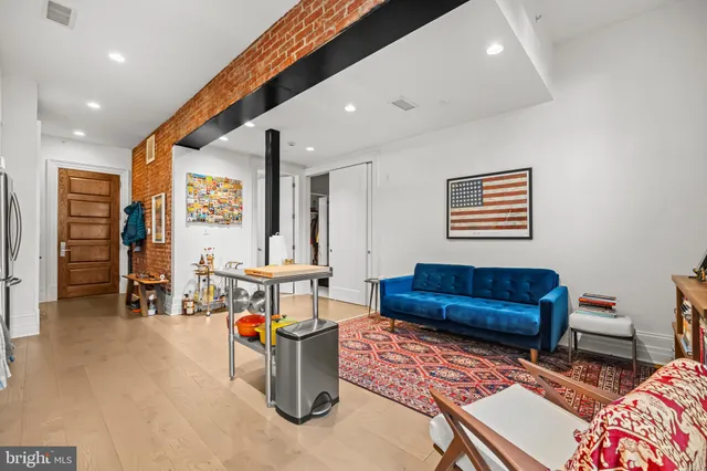 a living room with furniture and a couch